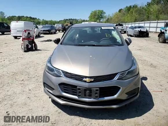 ✅ 2017 Chevrolet Cruze LT • VIN: 3G1BE6SM6HS572751 • Lot: 47690933. Listed on Copart with 65,685 mi. Free auction sales archive from the USA and detailed vehicle history report at DreamBid. Image 11.