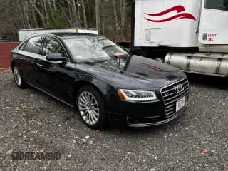 ✅ 2015 Audi A8 4.0T • VIN: WAU32AFD9FN024894 • Lot: 91904645. Wystawiony na Copart z przebiegiem 133 382 mil. Bezpłatny archiwum sprzedaży aukcyjnych z USA i szczegółowy raport historii pojazdu na DreamBid. Zdjęcie 1.