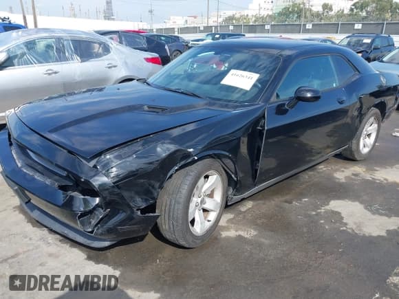 ✅ 2013 Dodge Challenger SXT • VIN: 2C3CDYAGXDH692706 • Lot: 41626341. Wystawiony na IAAI z przebiegiem 136 130 mil. Bezpłatny archiwum sprzedaży aukcyjnych z USA i szczegółowy raport historii pojazdu na DreamBid. Zdjęcie 17.