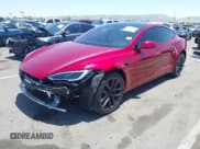 ✅ 2023 Tesla Model S Plaid • VIN: 5YJSA1E62PF510449 • Lot: 42527915. Listed on IAAI with 28,904 mi. Free auction sales archive from the USA and detailed vehicle history report at DreamBid. Image 2.