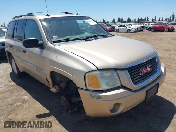 ✅ 2004 GMC Envoy SLE • VIN: 1GKDT13S542185110 • Lot: 42820472. Listed on IAAI with 343,397 mi. Free auction sales archive from the USA and detailed vehicle history report at DreamBid. Image 1.