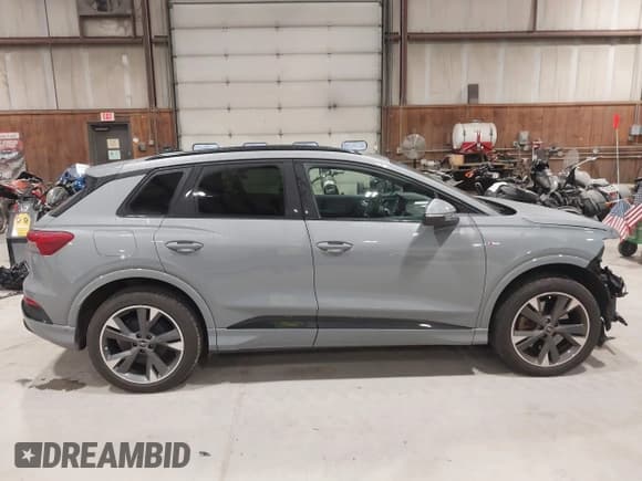 ✅ 2024 Audi Q4 e-tron Premium Plus • VIN: WA1L2BFZ6RP015108 • Лот: 43520477. Опубликован ранее на IAAI с пробегом 21 013 миль. Бесплатный доступ к архиву аукционных продаж из США и подробный отчёт об истории автомобиля на DreamBid. Изображение 13.