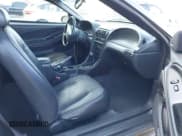 ✅ 2004 Ford Mustang Deluxe • VIN: 1FAFP44644F196058 • Lot: 43810293. Listed on IAAI with 136,950 mi. Free auction sales archive from the USA and detailed vehicle history report at DreamBid. Image 5.