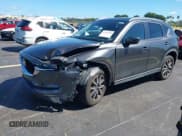 ✅ 2018 Mazda CX-5 Touring • VIN: JM3KFACM5J1349573 • Lot: 43341449. Listed on IAAI with 45,527 mi. Free auction sales archive from the USA and detailed vehicle history report at DreamBid. Image 2.