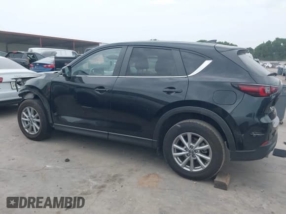 ✅ 2023 Mazda CX-5 S Carbon Edition • VIN: JM3KFBCM8P0202054 • Lot: 42392586. Listed on IAAI with 50,944 mi. Free auction sales archive from the USA and detailed vehicle history report at DreamBid. Image 14.