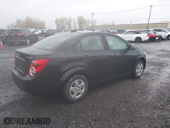 ✅ 2016 Chevrolet Sonic LS • VIN: 1G1JA5SG4G4172813 • Lot: 43608147. Listed on IAAI with 74,048 mi. Free auction sales archive from the USA and detailed vehicle history report at DreamBid. Image 4.