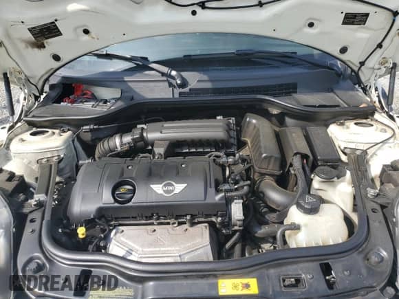 2013 MINI Hardtop с VIN WMWSU3C57DT681944, выставлен на аукционе Copart как лот 60126245 с пробегом 118 319 миль миль и Списание • Salvage title. История ставок и продаж доступна на DreamBid. Изображение 11.