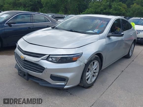 ✅ 2018 Chevrolet Malibu LT • VIN: 1G1ZD5ST0JF143540 • Lot: 42737601. Listed on IAAI with 142,193 mi. Free auction sales archive from the USA and detailed vehicle history report at DreamBid. Image 2.