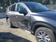 ✅ 2023 Mazda CX-5 S Carbon Edition • VIN: JM3KFBCM6P0143148 • Lot: 43382486. Wystawiony na IAAI z przebiegiem 22 099 mil. Bezpłatny archiwum sprzedaży aukcyjnych z USA i szczegółowy raport historii pojazdu na DreamBid. Zdjęcie 6.