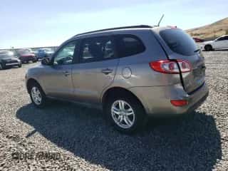 2012 Hyundai Santa Fe GLS z VIN 5XYZGDAB8CG160104, wystawiony jako Copart lot #69110294 z przebiegiem 141 325 mil mil oraz Szkoda całkowita • Salvage title. Historia ofert i sprzedaży dostępna na DreamBid. Obrazek 2.