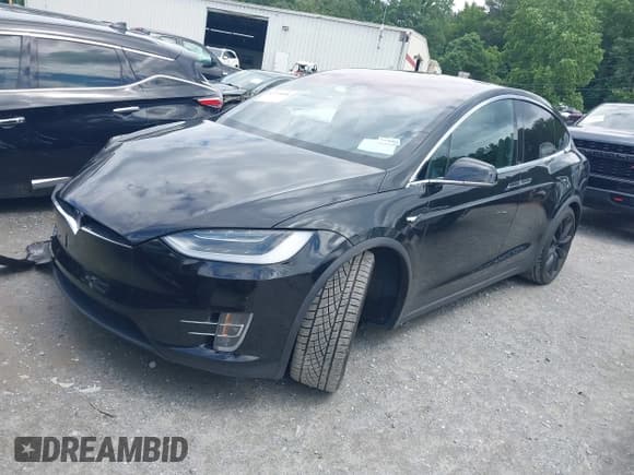 ✅ 2018 Tesla Model X 75D • VIN: 5YJXCBE25JF100156 • Лот: 42370888. Опубликован ранее на IAAI с пробегом 96 129 миль. Бесплатный доступ к архиву аукционных продаж из США и подробный отчёт об истории автомобиля на DreamBid. Изображение 2.