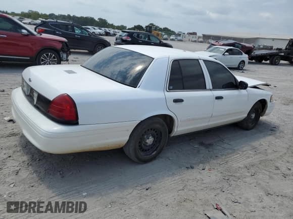 ✅ 2002 Ford Crown Victoria Police • VIN: 2FAFP71W62X109509 • Лот: 67917694. Опубликован ранее на Copart с пробегом 155 389 миль. Бесплатный доступ к архиву аукционных продаж из США и подробный отчёт об истории автомобиля на DreamBid. Изображение 3.