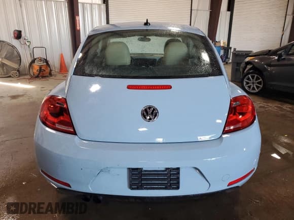 ✅ 2015 Volkswagen Beetle • VIN: 3VWH17AT8FM602312 • Лот: 90108125. Опубликован ранее на Copart с пробегом 59 021 миль. Бесплатный доступ к архиву аукционных продаж из США и подробный отчёт об истории автомобиля на DreamBid. Изображение 6.