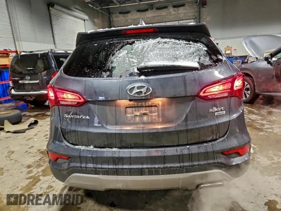 ✅ 2017 Hyundai Santa Fe 2.4L • VIN: 5XYZUDLB2HG487580 • Lot: 94909785. Wystawiony na Copart z przebiegiem 83 455 mil. Bezpłatny archiwum sprzedaży aukcyjnych z USA i szczegółowy raport historii pojazdu na DreamBid. Zdjęcie 6.