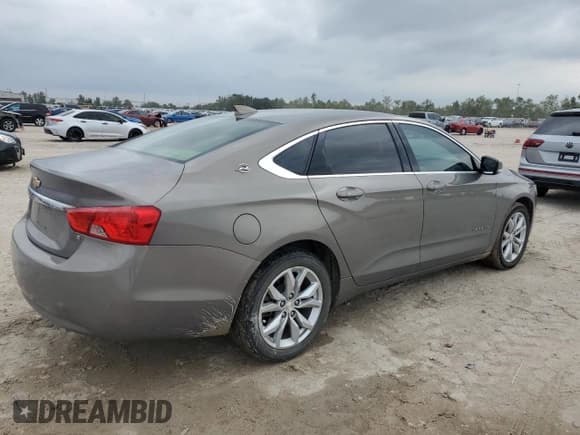 ✅ 2018 Chevrolet Impala LT • VIN: 2G1105S35J9132440 • Лот: 79299114. Опубликован ранее на Copart с пробегом 130 869 миль. Бесплатный доступ к архиву аукционных продаж из США и подробный отчёт об истории автомобиля на DreamBid. Изображение 3.