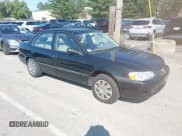 ✅ 2001 Toyota Corolla CE • VIN: 2T1BR12E01C468749 • Lot: 43194503. Listed on IAAI with 122,632 mi. Free auction sales archive from the USA and detailed vehicle history report at DreamBid. Image 1.