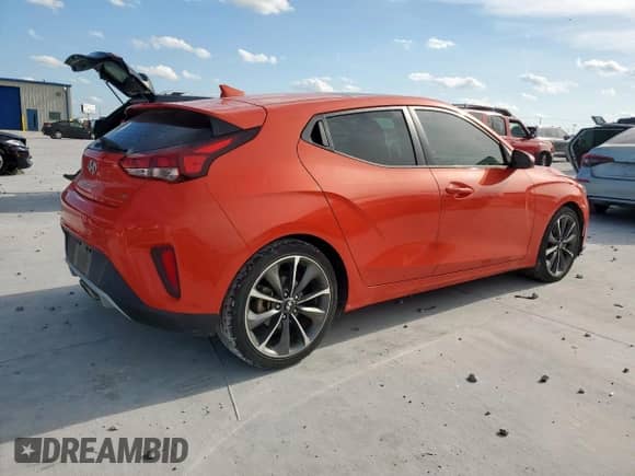 2019 Hyundai Veloster 2.0 z VIN KMHTG6AFXKU002926, wystawiony jako Copart lot #61302865 z przebiegiem 27 893 mil mil oraz Czysty tytuł • Clean title. Historia ofert i sprzedaży dostępna na DreamBid. Obrazek 3.