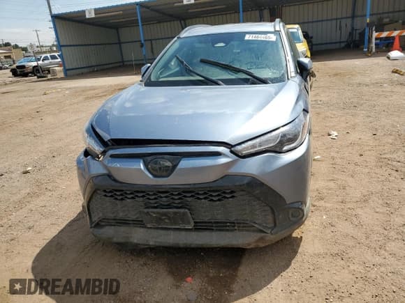 ✅ 2024 Toyota Corolla Cross Hybrid S • VIN: 7MUFBABG4RV058665 • Лот: 71464465. Опубликован ранее на Copart с пробегом 25 597 миль. Бесплатный доступ к архиву аукционных продаж из США и подробный отчёт об истории автомобиля на DreamBid. Изображение 5.