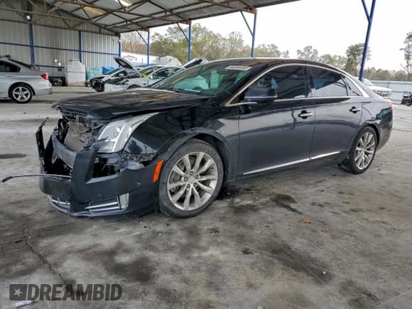 ✅ 2015 Cadillac XTS Luxury • VIN: 2G61M5S33F9120051 • Lot: 94888455. Listed on Copart with 602,804 mi. Free auction sales archive from the USA and detailed vehicle history report at DreamBid. Image 1.