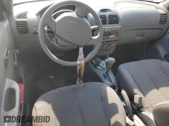 2001 Hyundai Accent GL с VIN KMHCG45C61U259715, выставлен на аукционе Copart как лот 51172295 с пробегом 37 440 миль миль и На запчасти • Non repairable. История ставок и продаж доступна на DreamBid. Изображение 8.