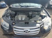 ✅ 2012 Hyundai Santa Fe SE • VIN: 5XYZHDAG5CG143933 • Lot: 68168694. Listed on Copart with 146,081 mi. Free auction sales archive from the USA and detailed vehicle history report at DreamBid. Image 12.