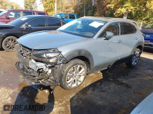 ✅ 2021 Mazda CX-30 Premium • VIN: 3MVDMBDL3MM252803 • Lot: 43520132. Wystawiony na IAAI z przebiegiem 44 307 mil. Bezpłatny archiwum sprzedaży aukcyjnych z USA i szczegółowy raport historii pojazdu na DreamBid. Zdjęcie 2.