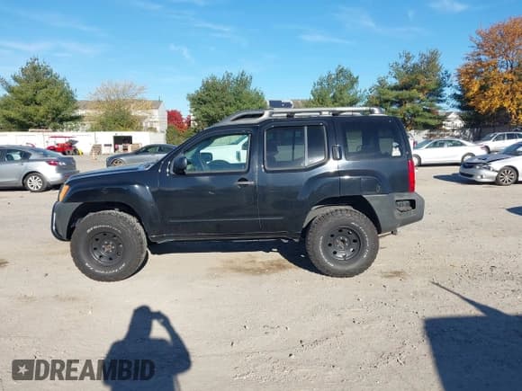 ✅ 2008 Nissan Xterra X • VIN: 5N1AN08W98C536174 • Lot: 43607169. Listed on IAAI with 98,513 mi. Free auction sales archive from the USA and detailed vehicle history report at DreamBid. Image 15.