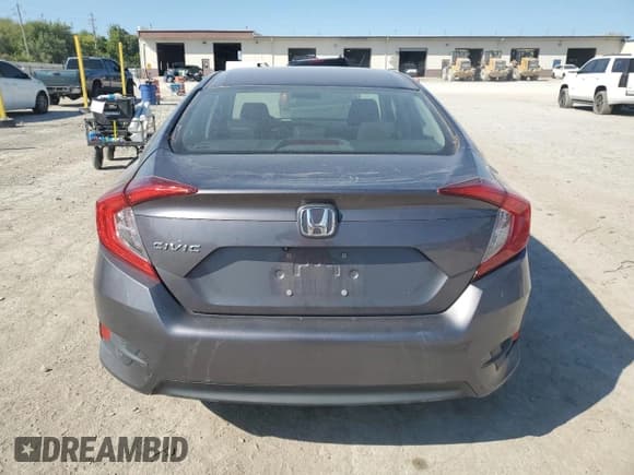 ✅ 2016 Honda Civic LX • VIN: 19XFC2F52GE020171 • Лот: 72046965. Опубликован ранее на Copart с пробегом 109 883 миль. Бесплатный доступ к архиву аукционных продаж из США и подробный отчёт об истории автомобиля на DreamBid. Изображение 6.