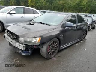 ✅ 2014 Mitsubishi Lancer Evolution GSR • VIN: JA32W8FV8EU014042 • Lot: 84048335. Wystawiony na Copart z przebiegiem 97 815 mil. Bezpłatny archiwum sprzedaży aukcyjnych z USA i szczegółowy raport historii pojazdu na DreamBid. Zdjęcie 1.