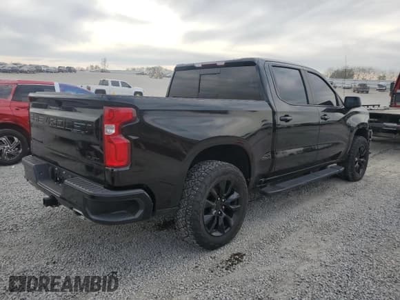 ✅ 2021 Chevrolet Silverado 1500 RST • VIN: 1GCUYEET1MZ299073 • Лот: 86660215. Опубликован ранее на Copart с пробегом 116 383 миль. Бесплатный доступ к архиву аукционных продаж из США и подробный отчёт об истории автомобиля на DreamBid. Изображение 3.