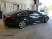 ✅ 2015 Jaguar XJ • VIN: SAJWJ1CDXF8V85631 • Lot: 70191865. Listed on Copart with 130,058 mi. Free auction sales archive from the USA and detailed vehicle history report at DreamBid. Image 3.