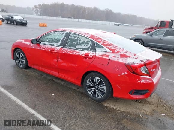 ✅ 2018 Honda Civic EX-T • VIN: JHMFC1F33JX009856 • Lot: 43631342. Listed on IAAI with 139,371 mi. Free auction sales archive from the USA and detailed vehicle history report at DreamBid. Image 3.