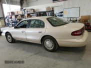 ✅ 1997 Lincoln Continental • VIN: 1LNLM97V7VY663898 • Lot: 81930975. Listed on Copart with 137,471 mi. Free auction sales archive from the USA and detailed vehicle history report at DreamBid. Image 2.