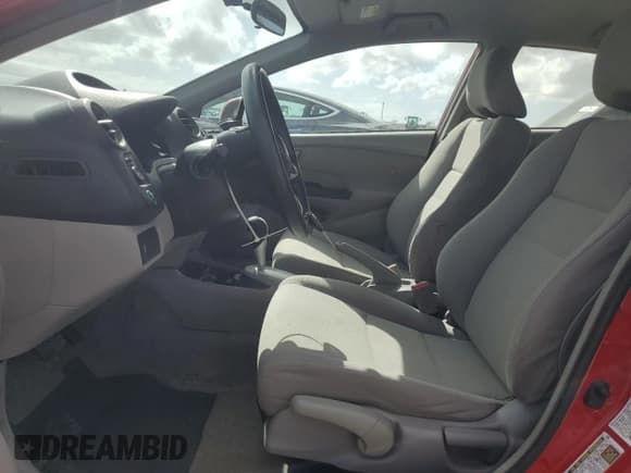 ✅ 2012 Honda Insight • VIN: JHMZE2H32CS006473 • Lot: 51710165. Listed on Copart with 175,524 mi. Free auction sales archive from the USA and detailed vehicle history report at DreamBid. Image 7.