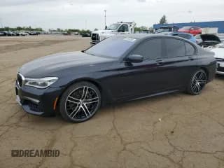 ✅ 2018 BMW 7 Series 750i xDrive • VIN: WBA7B0C52JG527205 • Lot: 57452265. Listed on Copart with 120,655 mi. Free auction sales archive from the USA and detailed vehicle history report at DreamBid. Image 1.