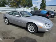 ✅ 2001 Jaguar XK • VIN: SAJDA41C01NA21437 • Lot: 78458894. Listed on Copart with 61,197 mi. Free auction sales archive from the USA and detailed vehicle history report at DreamBid. Image 4.
