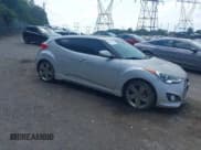 ✅ 2013 Hyundai Veloster Turbo • VIN: KMHTC6AE1DU177023 • Lot: 42604617. Listed on IAAI with 102,087 mi. Free auction sales archive from the USA and detailed vehicle history report at DreamBid. Image 1.