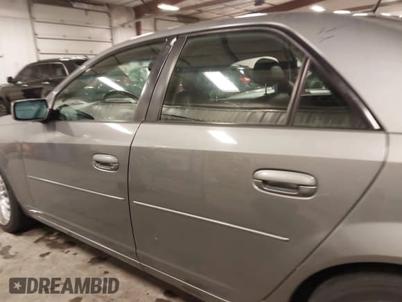 ✅ 2006 Cadillac CTS • VIN: 1G6DM57T860100264 • Лот: 41699855. Опубликован ранее на IAAI с пробегом 93 165 миль. Бесплатный доступ к архиву аукционных продаж из США и подробный отчёт об истории автомобиля на DreamBid. Изображение 15.