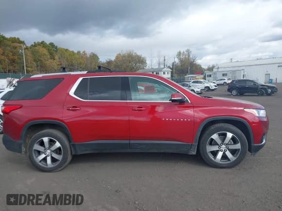 ✅ 2018 Chevrolet Traverse LT • VIN: 1GNEVHKW0JJ165203 • Lot: 43509948. Listed on IAAI with 89,827 mi. Free auction sales archive from the USA and detailed vehicle history report at DreamBid. Image 13.