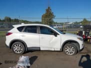 ✅ 2014 Mazda CX-5 Touring • VIN: JM3KE4CY4E0331665 • Лот: 43160091. Опубликован ранее на IAAI с пробегом Не указан. Бесплатный доступ к архиву аукционных продаж из США и подробный отчёт об истории автомобиля на DreamBid. Изображение 13.
