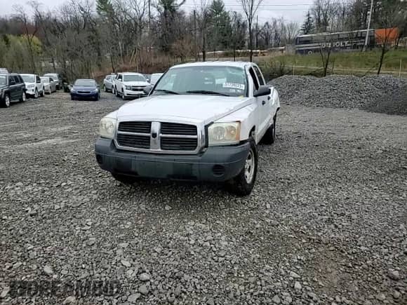 2005 Dodge Dakota ST с VIN 1D7HW28K45S327165, выставлен на аукционе Copart как лот 51739225 с пробегом 166 932 миль миль и Списание • Salvage title. История ставок и продаж доступна на DreamBid. Изображение 11.