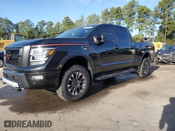 ✅ 2024 Nissan Titan Pro-4X • VIN: 1N6AA1FB6RN107082 • Lot: 71445445. Listed on Copart with Not provided. Free auction sales archive from the USA and detailed vehicle history report at DreamBid. Image 1.