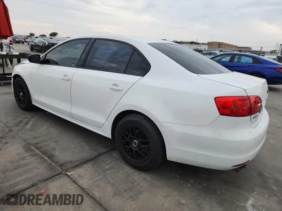✅ 2014 Volkswagen Jetta S • VIN: 3VW2K7AJ1EM334848 • Lot: 90334225. Listed on Copart with 86,766 mi. Free auction sales archive from the USA and detailed vehicle history report at DreamBid. Image 2.