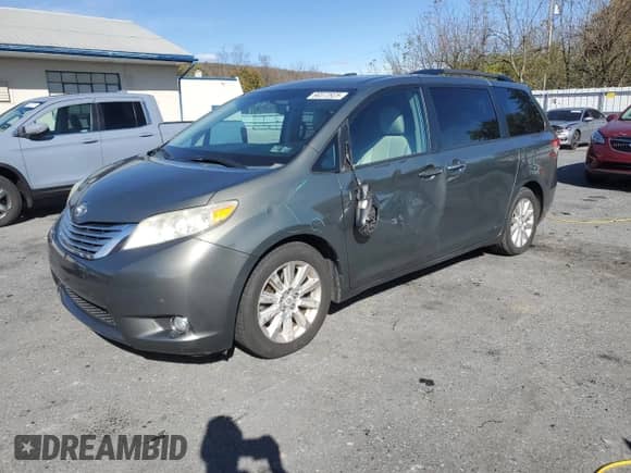 2011 Toyota Sienna XLE AAS with VIN 5TDYK3DC0BS096862, listed as a Copart auction lot 90372925 with 329,114 mi miles and Salvage title. Bid and sale history available at DreamBid. Image 1.