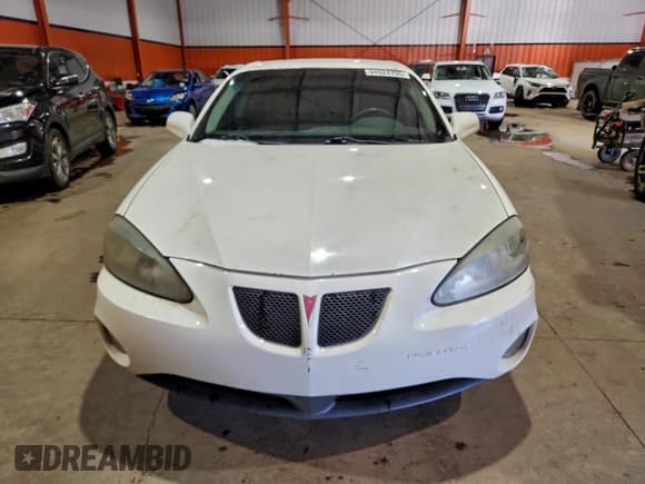 ✅ 2004 Pontiac Grand Prix GT1 • VIN: 2G2WP522041342693 • Lot: 94524795. Wystawiony na Copart z przebiegiem 302 619 mil. Bezpłatny archiwum sprzedaży aukcyjnych z USA i szczegółowy raport historii pojazdu na DreamBid. Zdjęcie 5.