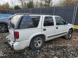 2001 Chevrolet Blazer LT z VIN 1GNCS13W612198738, wystawiony jako Copart lot #80969694 z przebiegiem 299 569 mil mil oraz Szkoda całkowita • Salvage title. Historia ofert i sprzedaży dostępna na DreamBid. Obrazek 3.