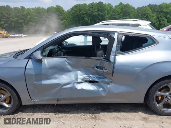 2019 Hyundai Veloster Premium with VIN KMHTG6AF5KU017950, listed as a IAAI auction lot 42611554 with 105,396 mi miles and . Bid and sale history available at DreamBid. Image 6.