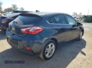 ✅ 2018 Chevrolet Cruze LT • VIN: 3G1BE6SM5JS601680 • Lot: 41832083. Listed on Copart with 82,357 mi. Free auction sales archive from the USA and detailed vehicle history report at DreamBid. Image 3.