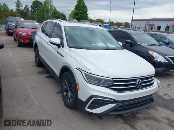 ✅ 2023 Volkswagen Tiguan SE • VIN: 3VVMB7AX0PM036876 • Lot: 42023415. Listed on IAAI with 42,003 mi. Free auction sales archive from the USA and detailed vehicle history report at DreamBid. Image 1.