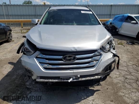 2014 Hyundai Santa Fe с VIN 5XYZU3LAXEG206428, выставлен на аукционе Copart как лот 71009555 с пробегом 56 183 миль миль и На запчасти • Non repairable. История ставок и продаж доступна на DreamBid. Изображение 5.